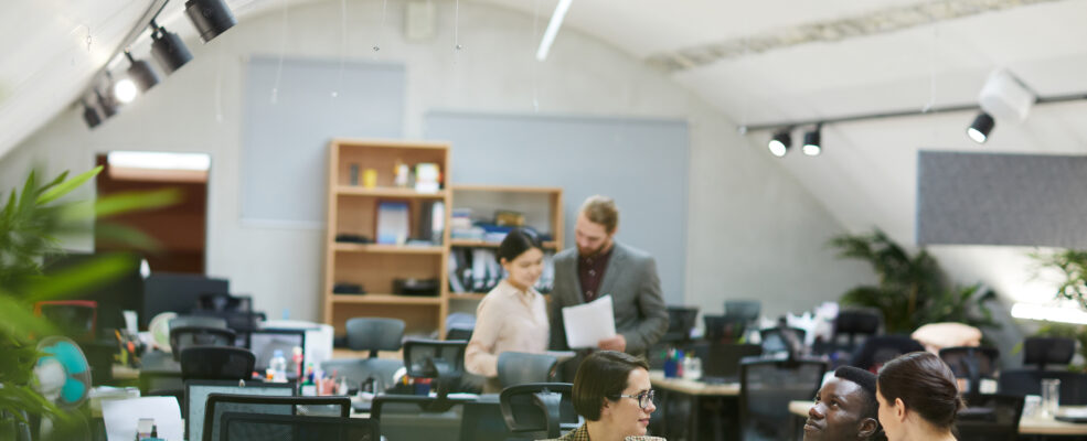 Business people in a design office going over good brand designs