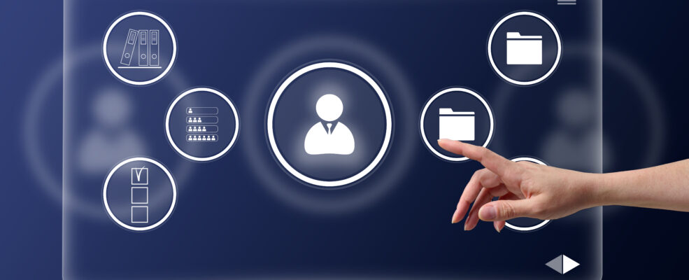 Virtual screen with database, documentation, checklists, archive. Represents the concept of effective company resource management, the hand touches the icon
